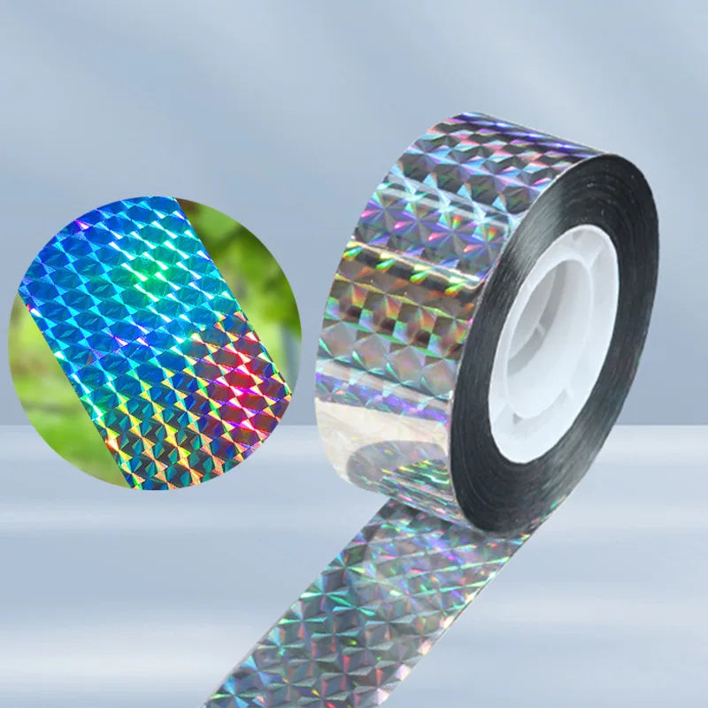 Roll of reflective bird deterrent tape showing iridescent colors and patterns.