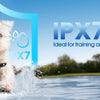 A white dog jumping in water with an IPX7 waterproof training collar and a blue shield graphic.