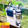 A white wall-mounted aquarium filter with tubing and a blue housing is visible in an aquatic environment.
