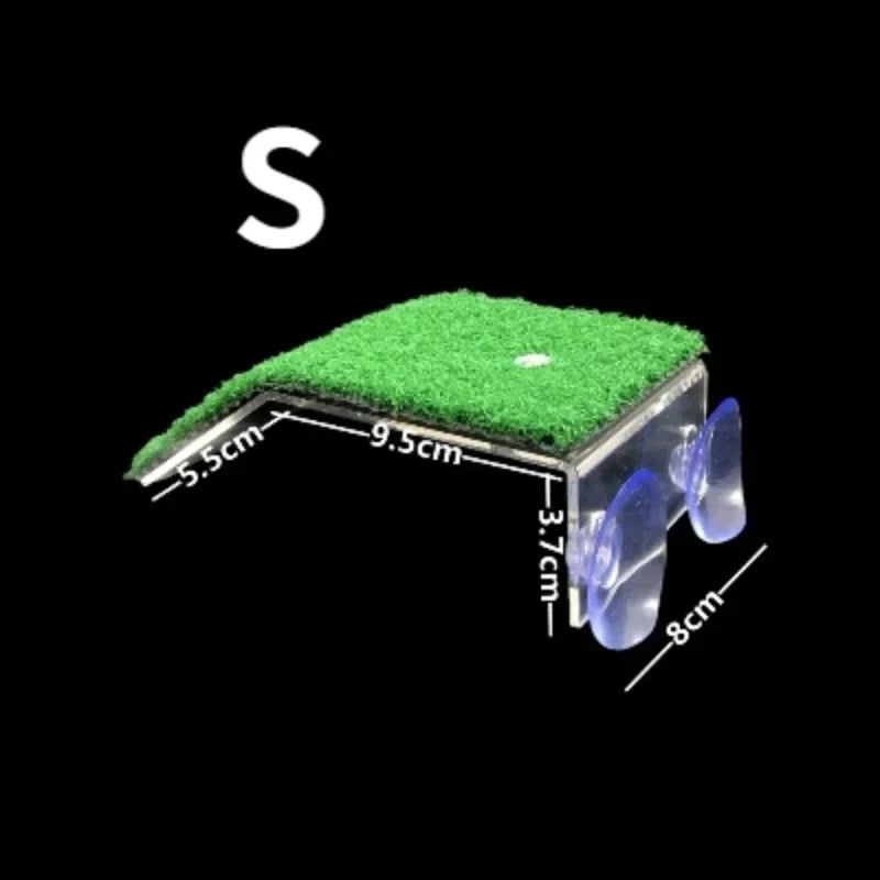 A green basking platform for aquatic turtles featuring suction cups.