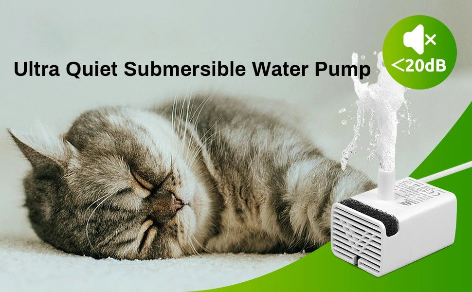 A fluffy cat is resting near a white submersible water pump device with a cleaning brush.