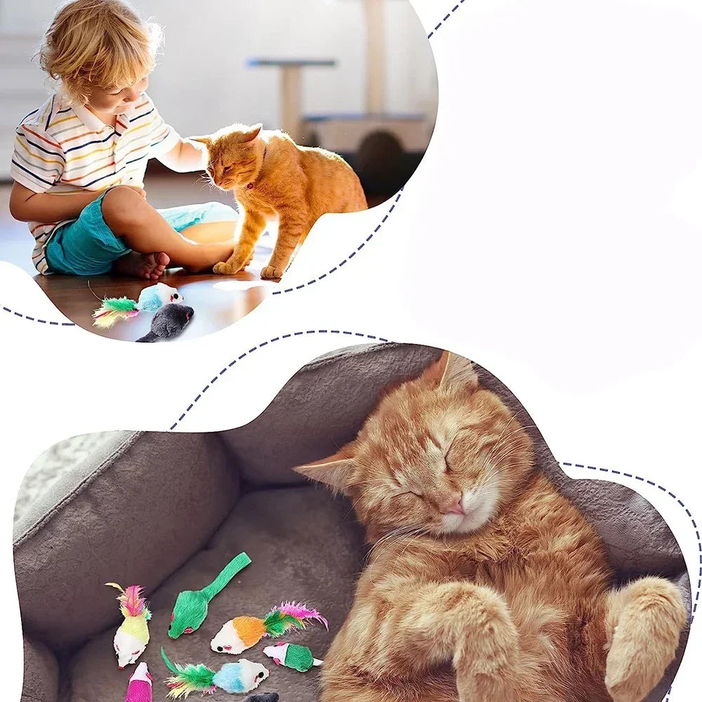A fluffy orange cat is sleeping inside a gray sofa, with small green and pink cat mice toys nearby.