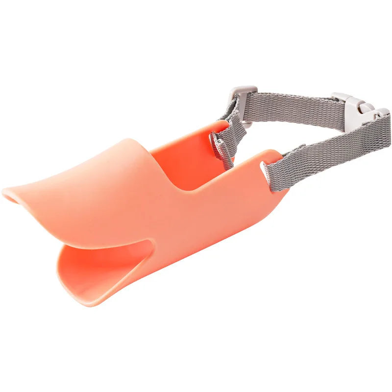 Orange silicone duck-shaped dog muzzle with a gray adjustable strap