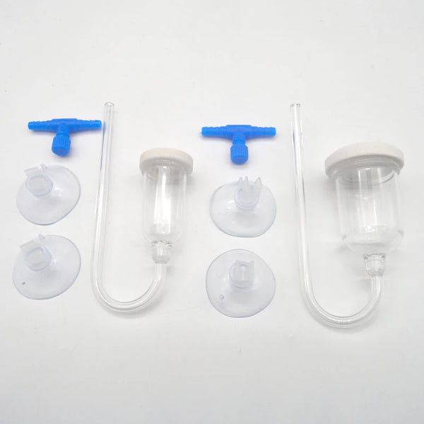 A set of aquarium CO2 diffuser components including a control valve, tubing, and bubble counter.