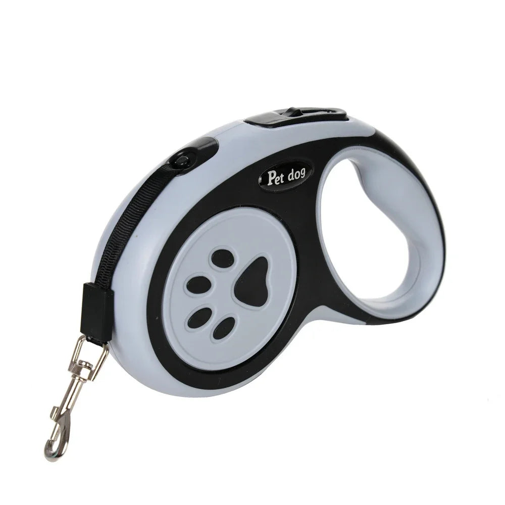 Correa retráctil de nylon blanca y negra para mascota con asa y clip, sobre fondo blanco.