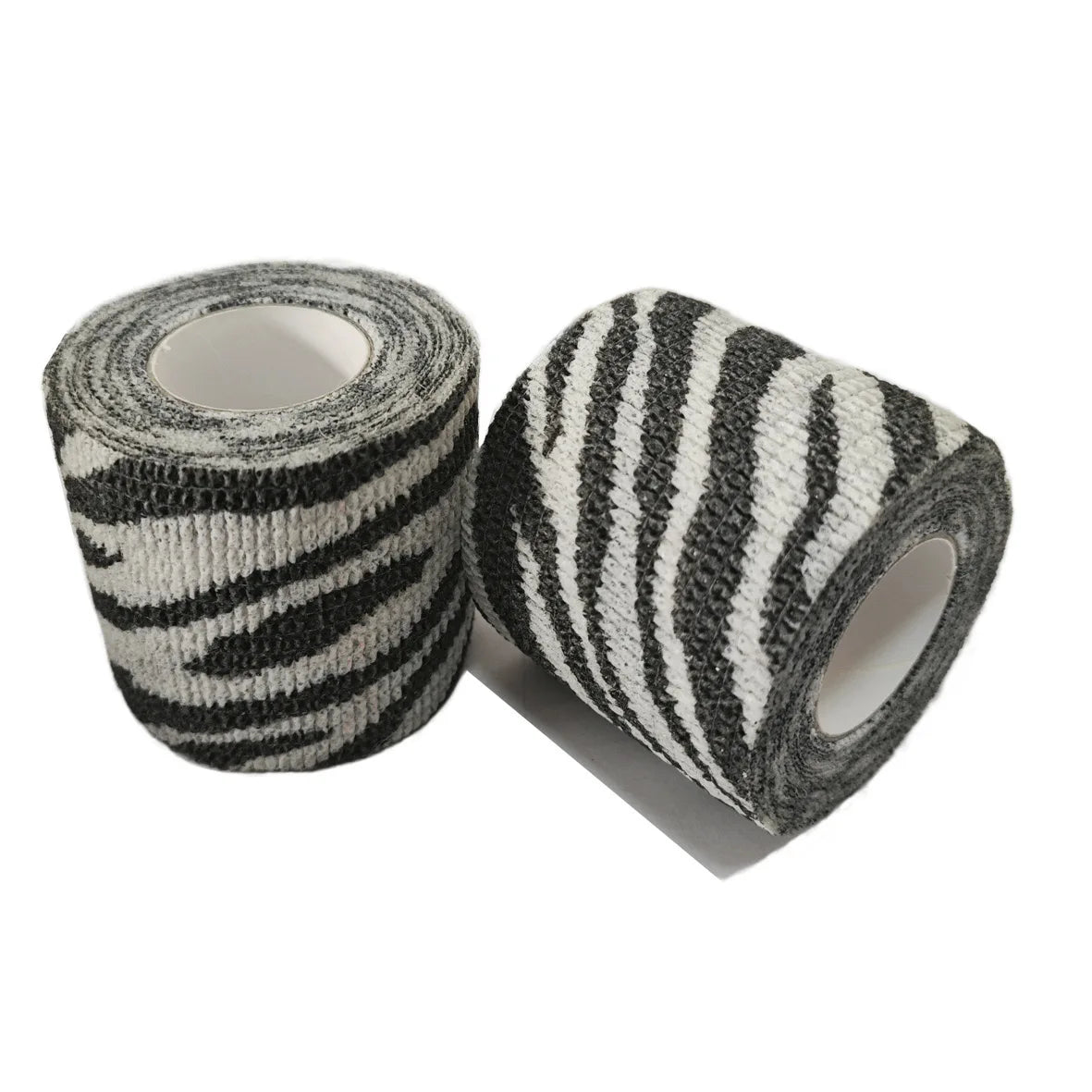 Rollen bunter selbstklebender Tattoo-Grip-Verbindungen in schwarz-weißen Zebrastreifenmotiven