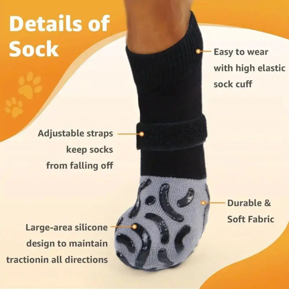 A close-up of a black anti-slip cotton dog sock with an elastic cuff and silicone grip design.
