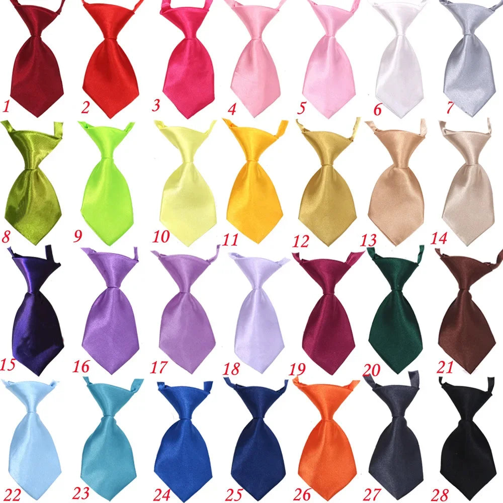 Colección de 28 lazos ajustables para mascotas, en varios colores y estilos para perros y gatos.