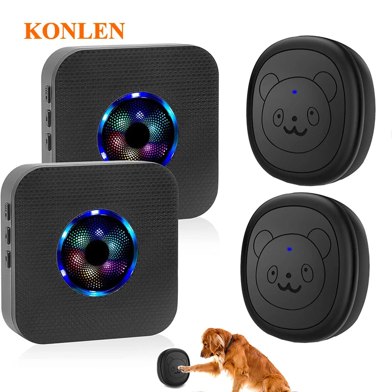 A black wireless dog doorbell device shown in various forms, including a rectangular unit and a round button, with a dog near