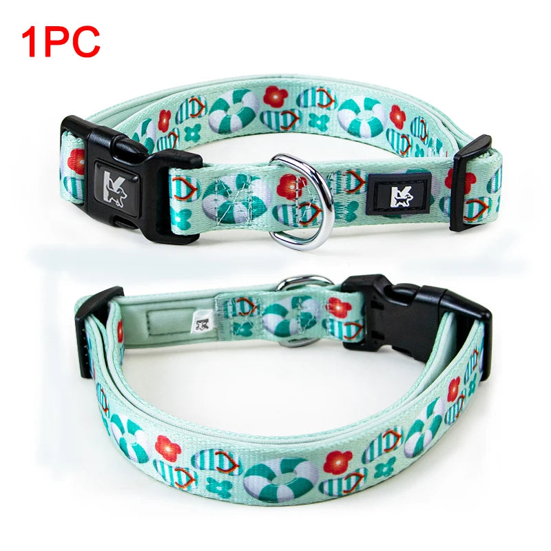 A single green and white plaid polyester dog collar with a black buckle is shown.