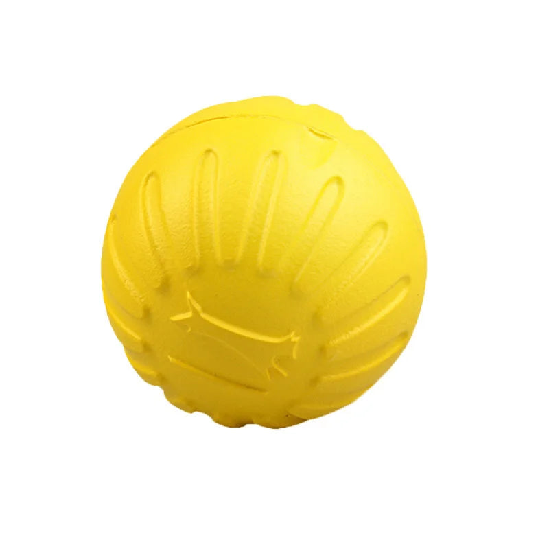A bright yellow durable rubber dog chew ball with a rope for fetch and training.