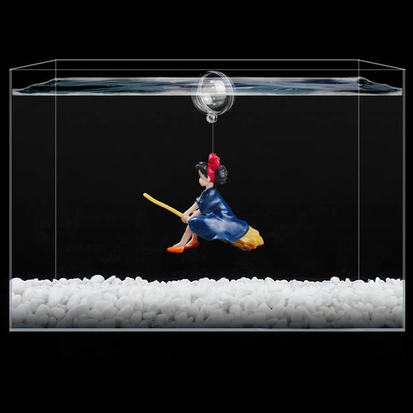 A mermaid figure is suspended in water above a bed of white foam, with a transparent line separating the two.
