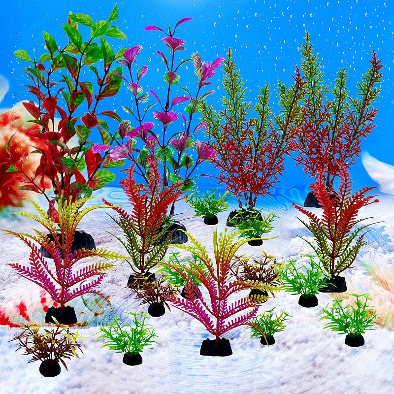 A vibrant set of 18 artificial aquarium plants featuring red, pink, and green foliage displayed on white sand.