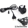 Black submersible aquarium water pump with a cord and multiple output options