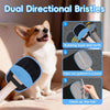 A pair of blue and black dual directional bristles pet hair removal gloves being used on a dog's fur.