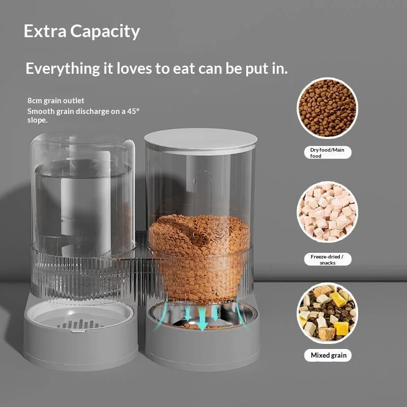 A clear automatic gravity pet feeder and water dispenser combo with a grain outlet and various food types visible.