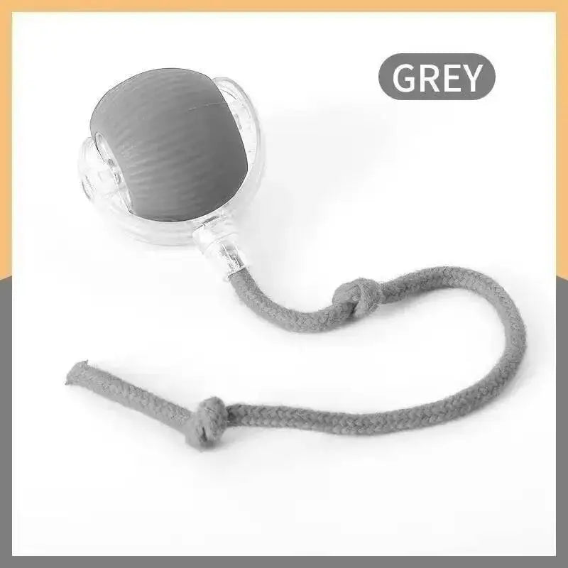 A grey interactive pet ball for dogs and cats with a cord attached.
