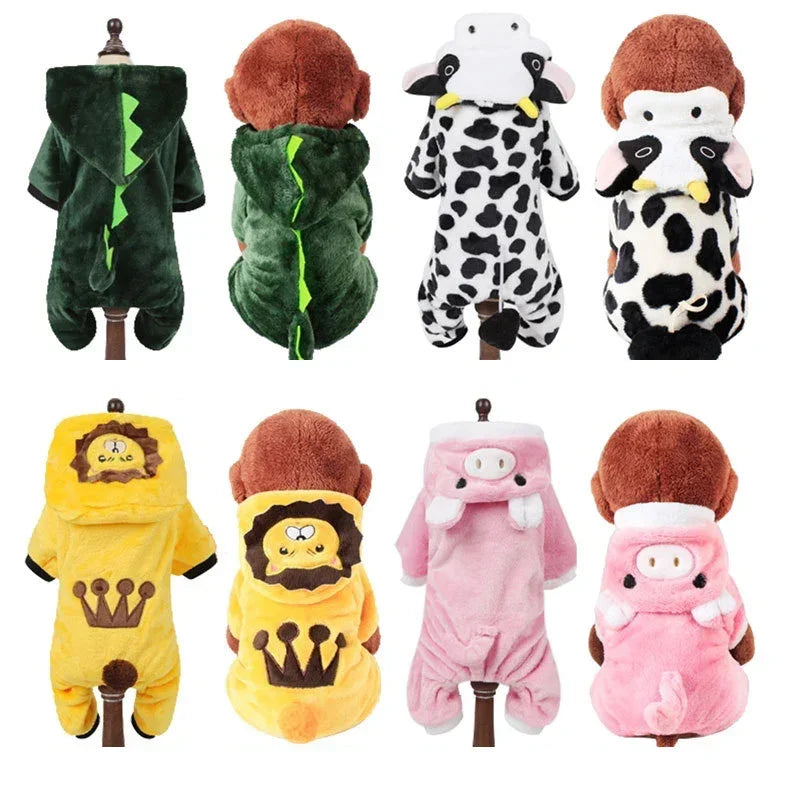 A collection of cartoon animal pet costumes including a green dinosaur jumpsuit, a black and white spotted animal suit, and p