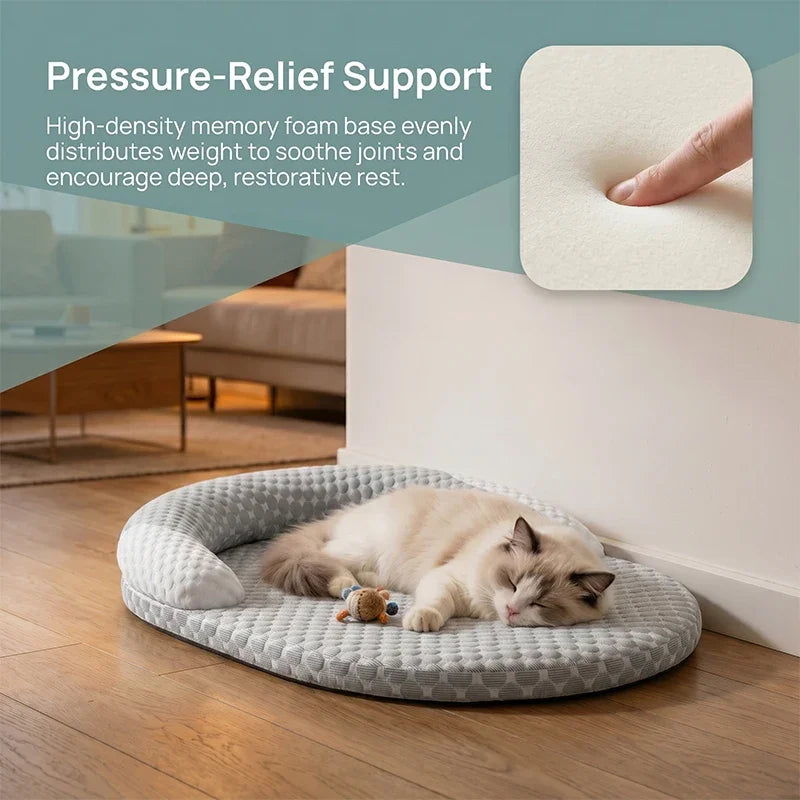 A fluffy white cat is resting on a gray cooling ice silk pet mat indoors.