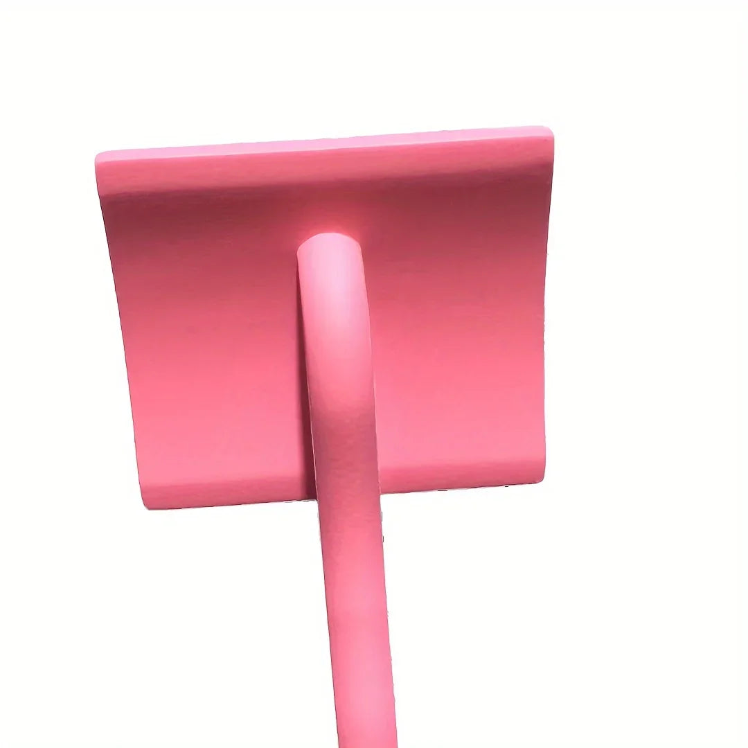 A pink extra-long pin dog slicker brush used for detangling and de-shedding.
