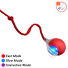 Red self-moving cat toy ball with LED lights and a faux tail