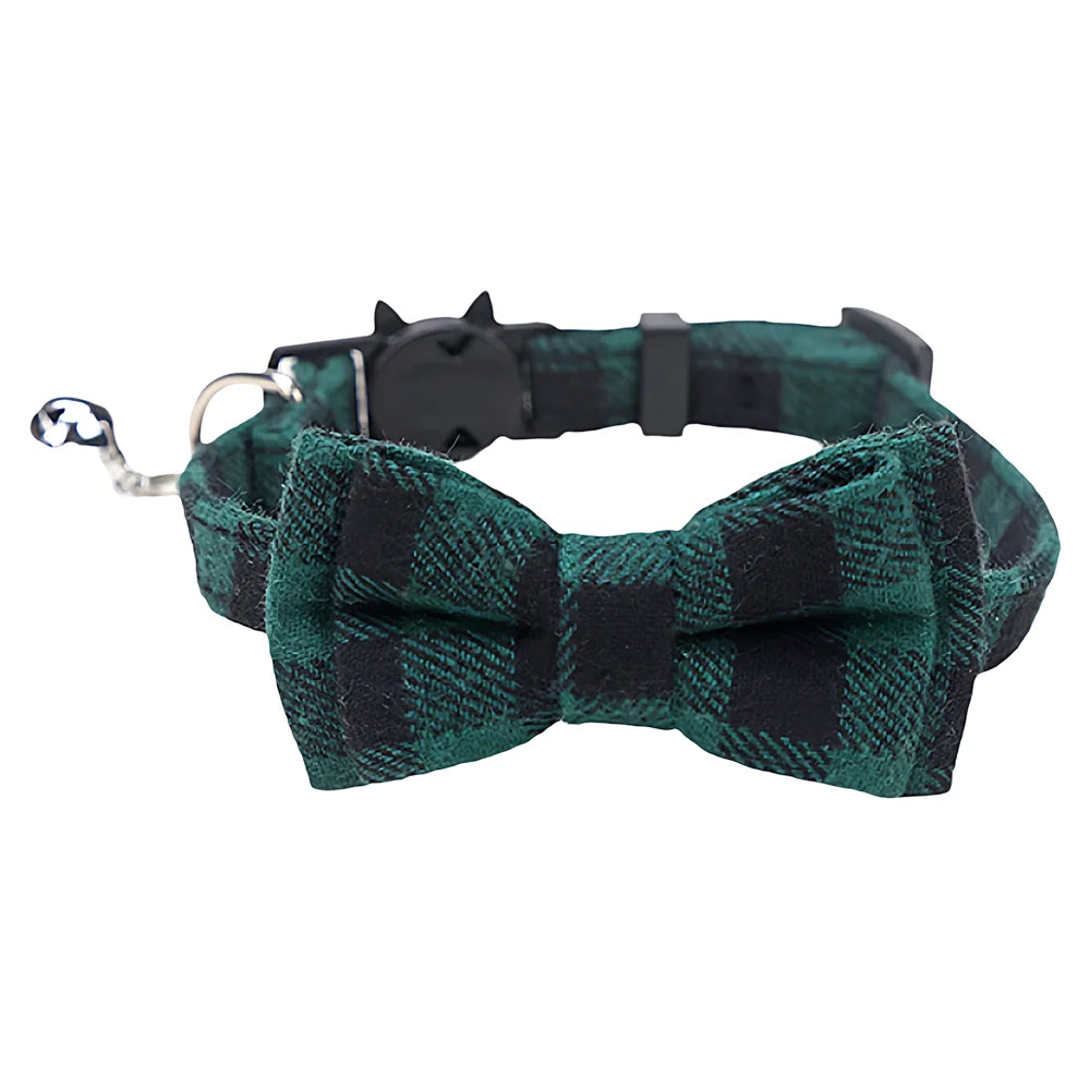A dark green plaid bow tie collar for cats and small dogs.