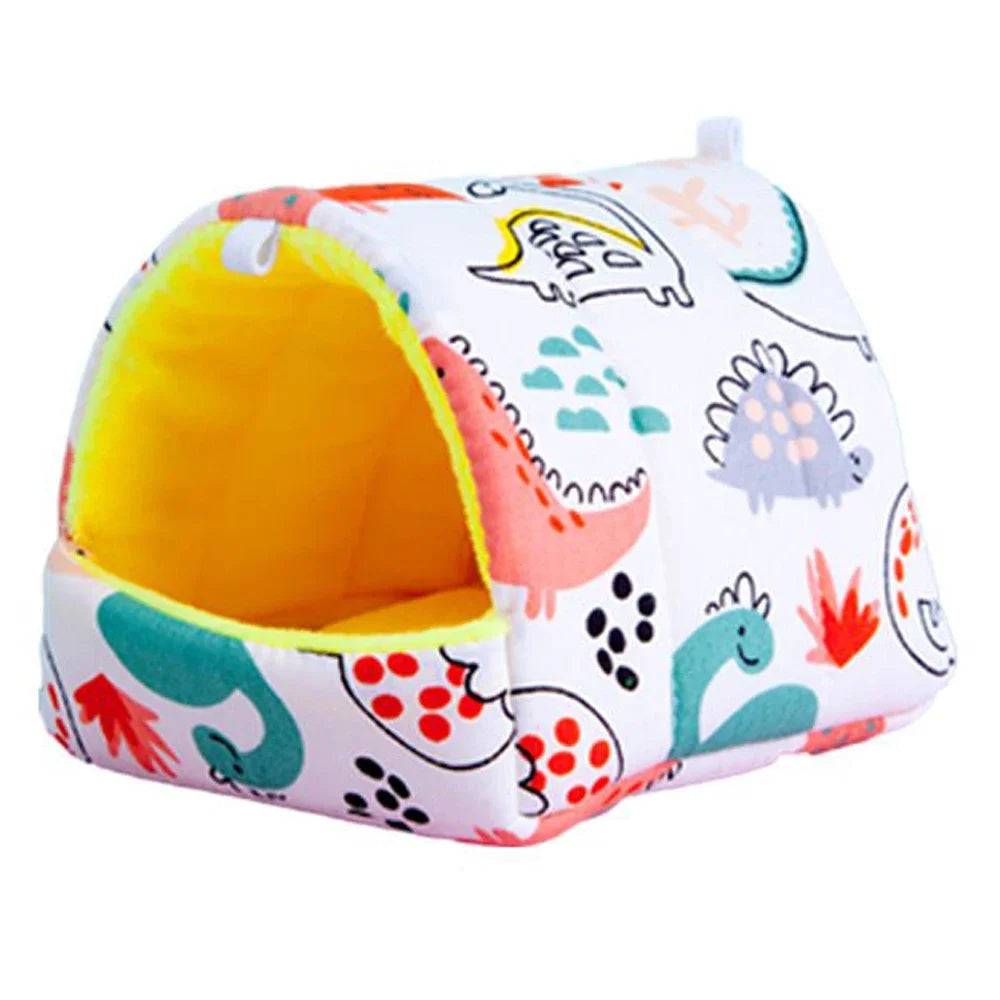 A white flannel pet nest bed shaped like a dinosaur with an open entrance.