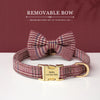 A maroon and purple plaid removable bow dog collar with a gold buckle and engraved nameplate.