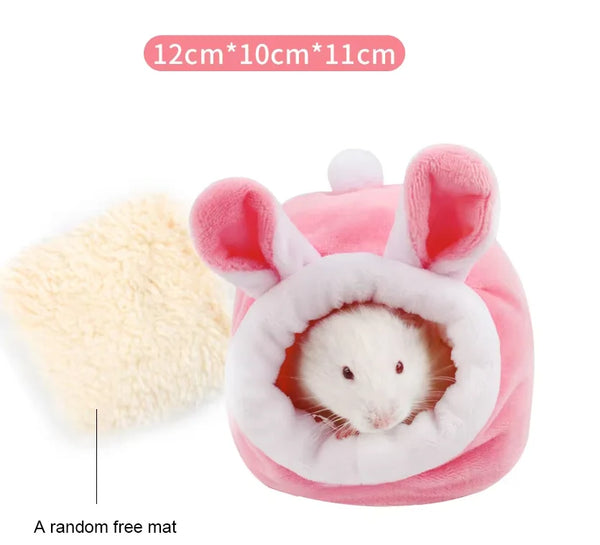 A pink fleece pet hammock shaped like a rabbit for small animals