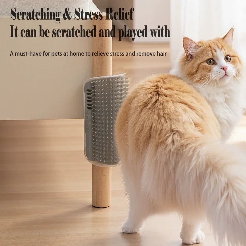 A fluffy orange and white cat is being groomed with a gray silicone scratching and stress relief comb mounted on a wooden pos