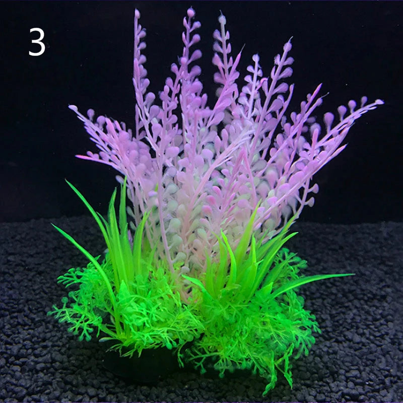 Un grupo de plantas acuáticas artificiales con follaje rosa y verde.