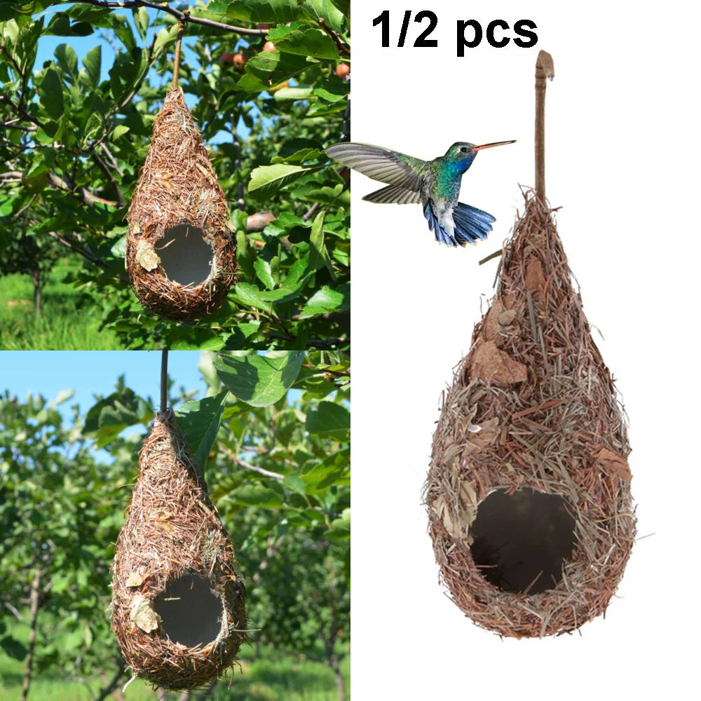Half a hand-woven grass bird nest decoration with a hummingbird perched on it.