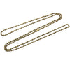A set of gold and silver plated ball necklaces laid out on a white background.