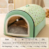 A light green pet bed with a fabric cover and an inner fleece lining is shown on a surface.