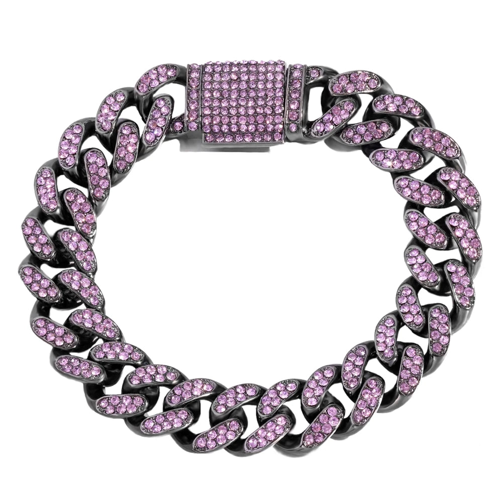 A silver-toned Cuban link bracelet set with pink and clear rhinestones.