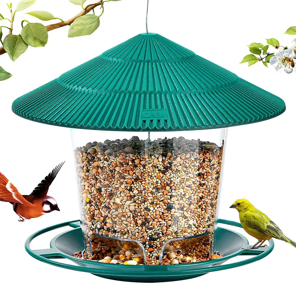 Mangeoire à graines pour oiseaux verte et imperméable, suspendue par un fil.