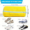 Yellow durable shoe washing bag designed to fit most shoes, shown next to various footwear.
