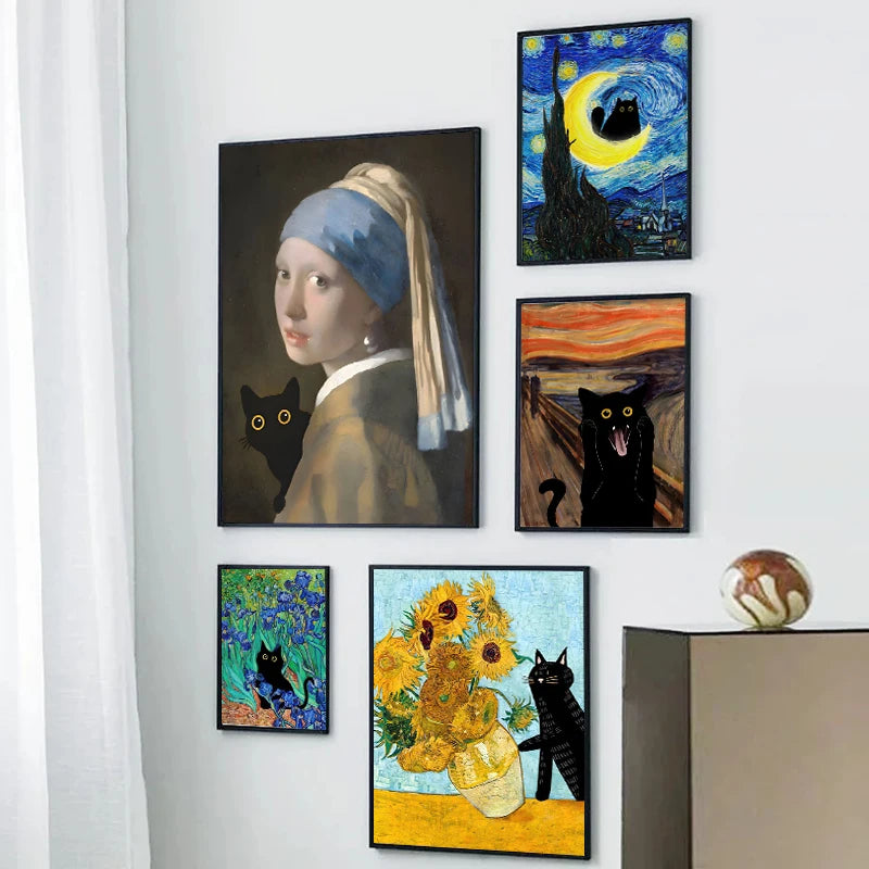 A gallery wall featuring several canvas prints depicting cats and figures in various artistic styles.