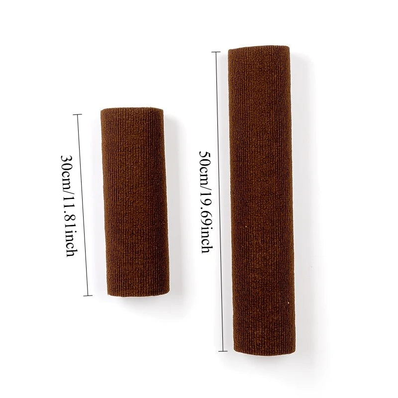 A dark brown, cylindrical cat scratcher post with a self-adhesive mount shown next to a ruler for scale.