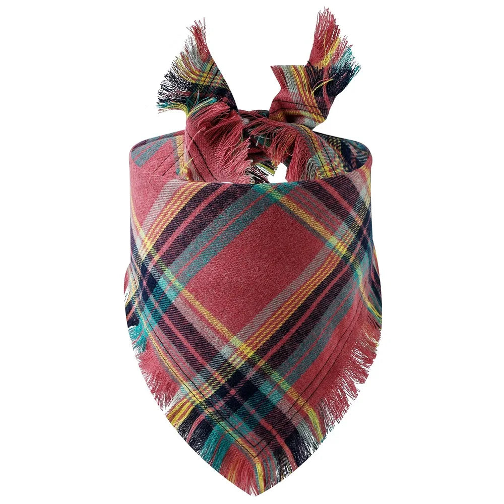 A plaid fabric bandana featuring shades of red, brown, black, and teal with fringed edges.