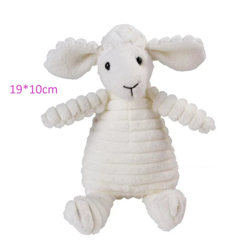 A white fluffy sheep plush toy with long ears and a stitched face.