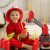 A smiling child is holding a red fire hydrant straw cup with a yellow straw and lid, set against a blurred background.
