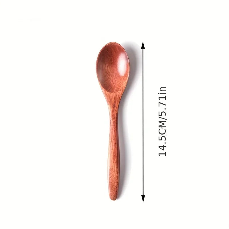 A single wooden tea or coffee spoon with a reddish-brown finish shown next to a vertical measurement scale.