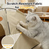 A gray cat is interacting with a beige scratch-resistant fabric pet tent bed for longevity.