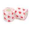 Pinkes Stoffband mit roten Herzmustern als selbstklebendes Tattoo-Grip-Verband