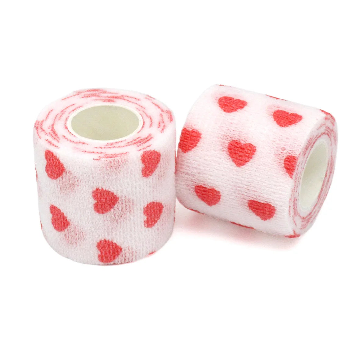 Pinkes Stoffband mit roten Herzmustern als selbstklebendes Tattoo-Grip-Verband