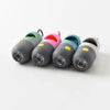 A collection of five colorful capsule dog waste bag dispensers with LED flashlights arranged horizontally.