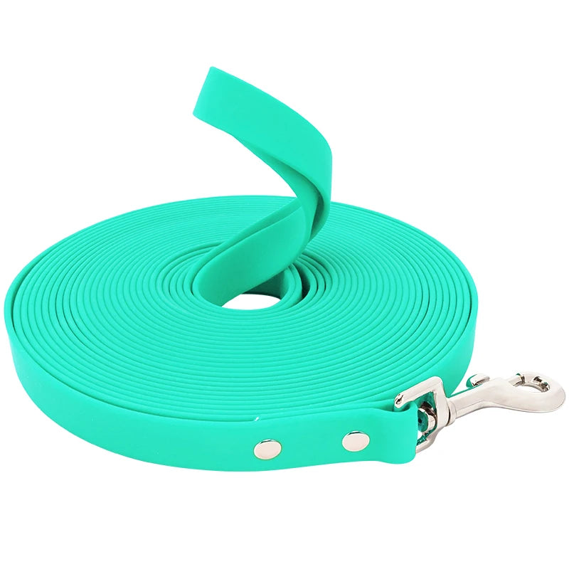 A coil of bright teal heavy-duty waterproof dog leash with a metal clasp.