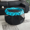 Faltbare achteckige Hund- und Katzenzelt in schwarz und hellblau auf grauem Teppich.