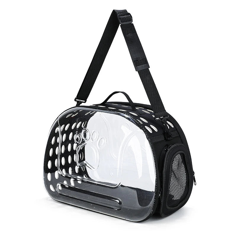 A black transparent foldable pet travel carrier with a shoulder strap.